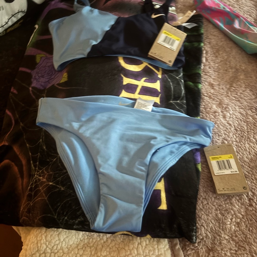 COPY - New w tags Nike swim suit .super cute .just came out week 1/15/25